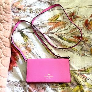 Kate Spade wristlet. Bubble gum pink 6.25 inches across. About 3.5” tall